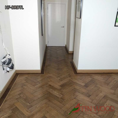 Herringbone flooring with border and tramline by Fin Wood Ltd London #CraftedForLife