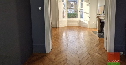 Victorian terrace uplifted with wide engineered oak boards and a statement chevron parquet, Brockley SE14