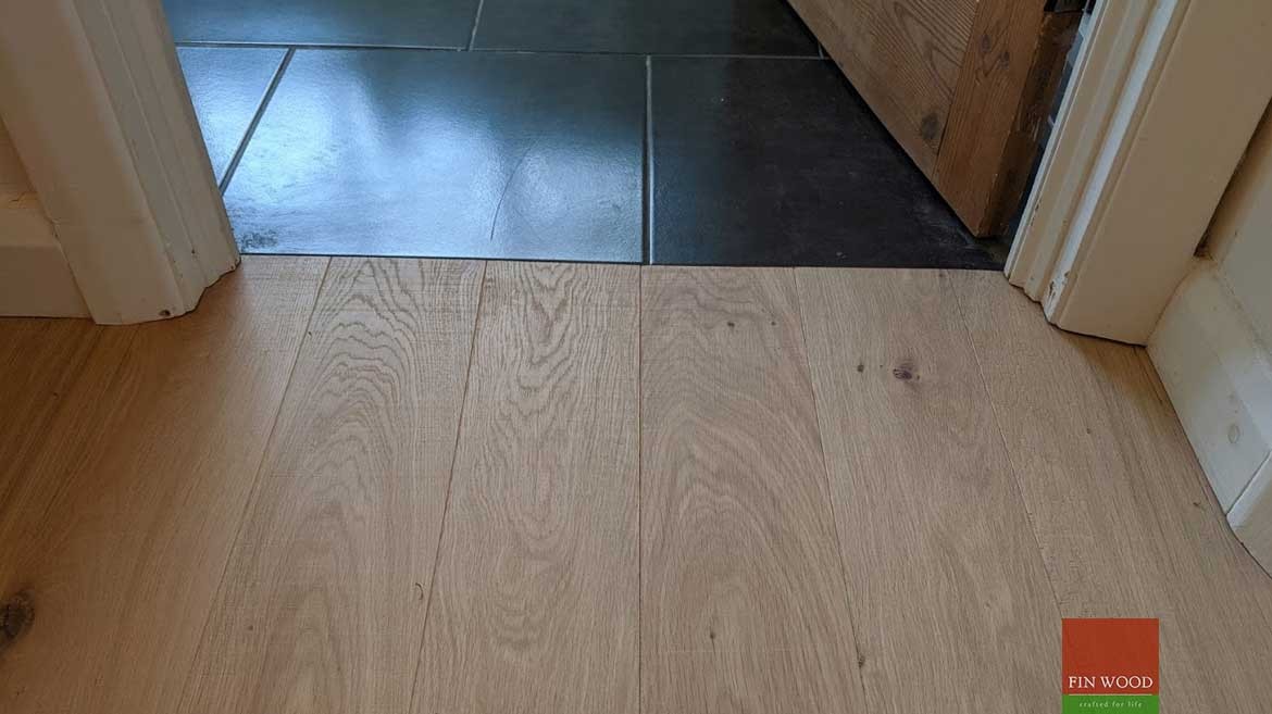 Transition to tiles and carpet in wood flooring by Fin Wood Ltd #CraftedForLife